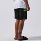 MANNERS 18' SWIM TRUNK  // BLACK/LIME